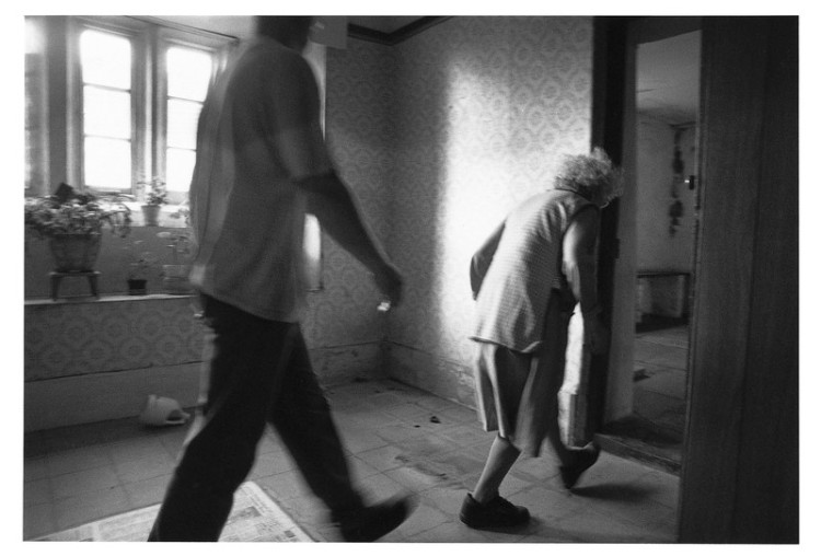 Betty leads the removal man to clear the dairy.jpg