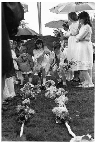 Laying flowers at the feet of the May Queen 1978.jpg